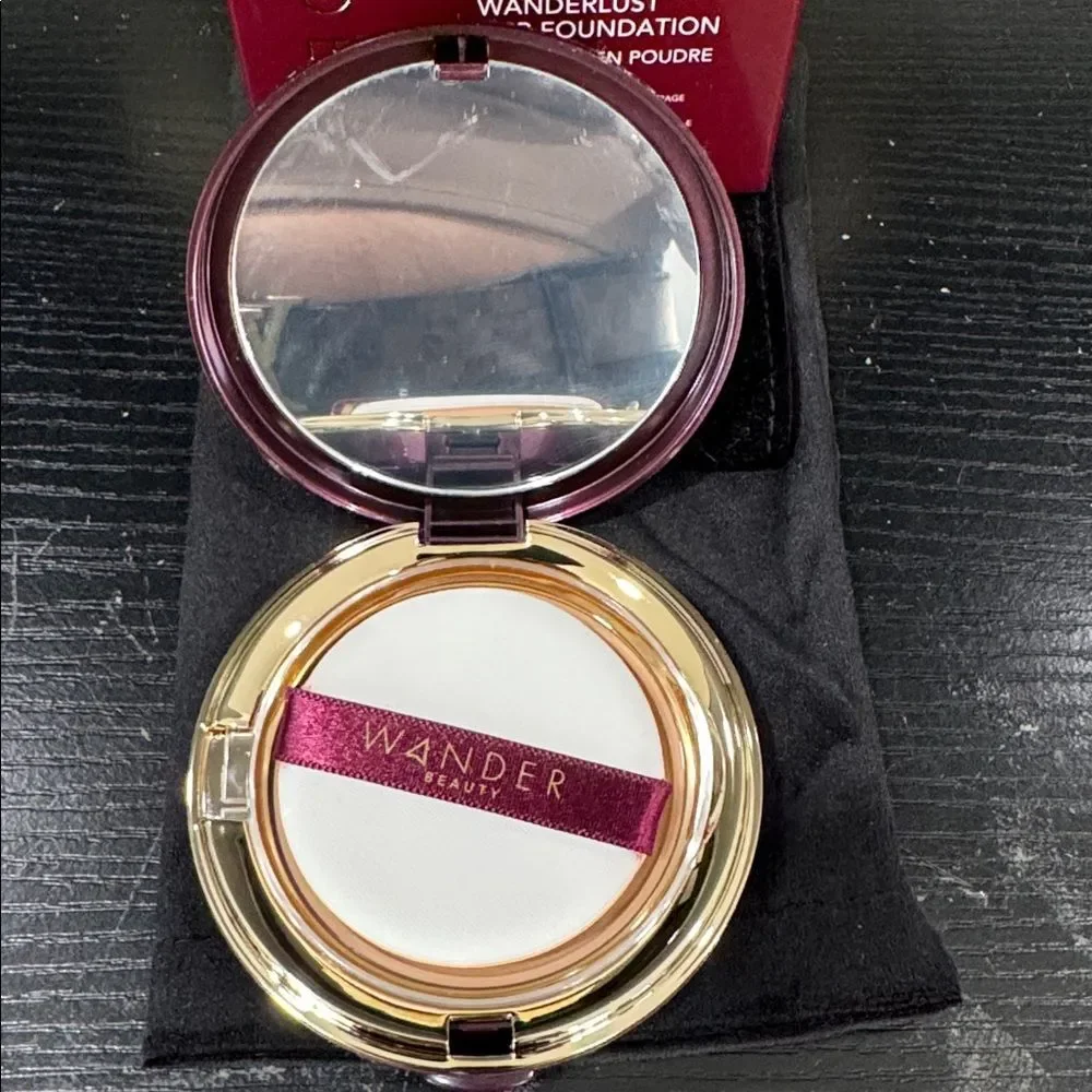 Wander Beauty Wanderlust Powder Foundation shade Rich-rich tan with warm golden